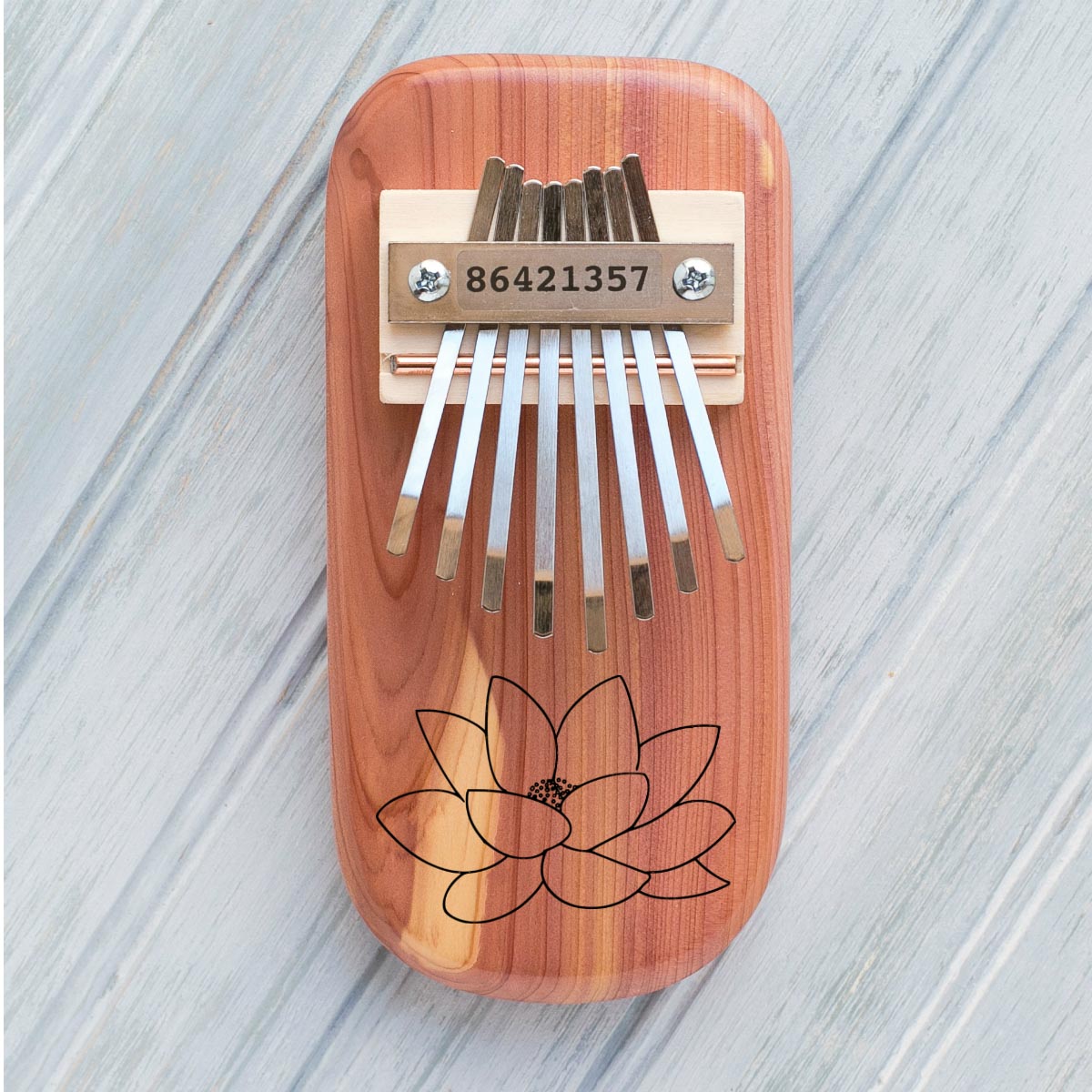 Lotus Flower Engraved Thumb Piano Mountain Melodies
